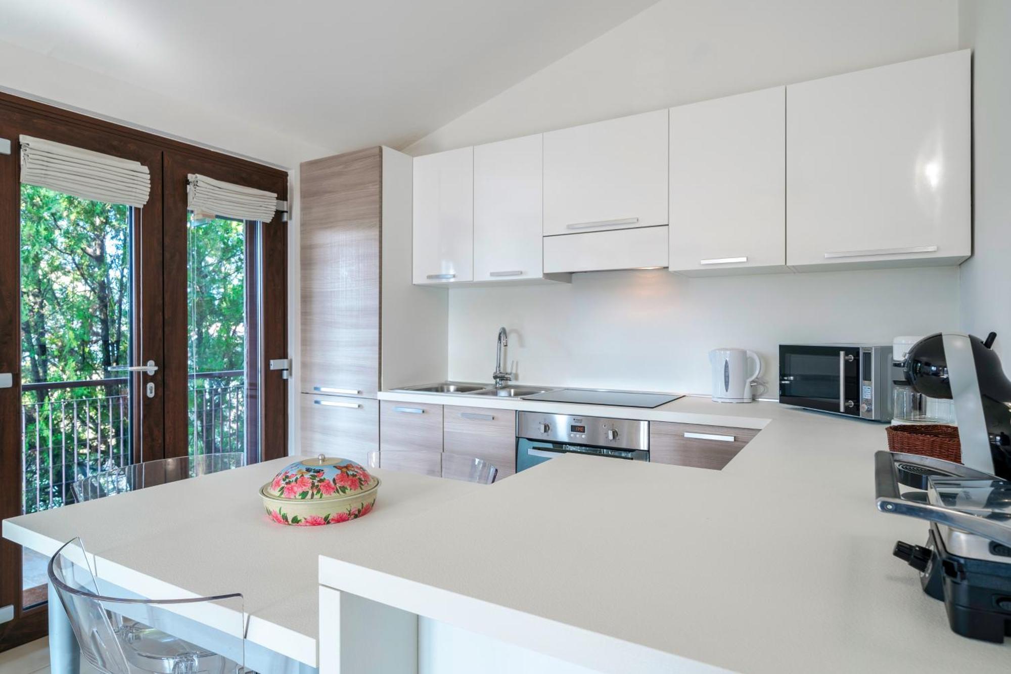 Casa Lugana 15 - Monolocale Con Piscina Fronte Lago Сірміоне Екстер'єр фото